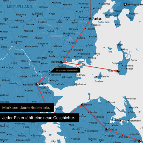 Detailed map of Denmark as a blue pinboard canvas, with travel destinations in Central Jutland marked with pins and a travel route depicted with yarn