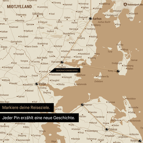 Detailed map of Denmark as a Treasure Gold pinboard canvas, featuring travel destinations in Central Jutland marked with pins and a travel route depicted with string