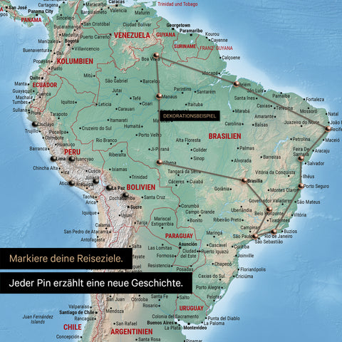 Detail of a physical world map as a pin board in Multicolor Terra with pins, showing a mapped out travel route in South America through the countries of Brazil, Peru and Ecuador