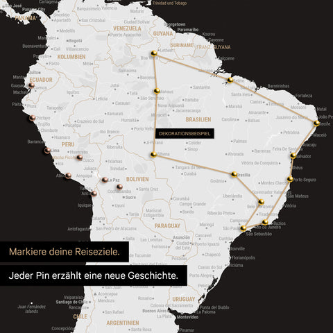 Detail of a push pin world map in Black & White with pins, showing a mapped out travel route in South America through the countries of Brazil, Peru and Ecuador