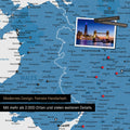 Detail of a map of Wales and England in blue with pins marking visited travel destinations