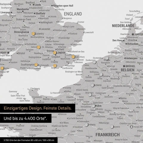 Ausschnitt einer magnetischen Europakarte in Hellgrau zeigt einen Ausschnitt von England, Frankreich und Belgien mit Details wie Nationalparks, Flüssen und zahlreichen kleineren Orten und Städten