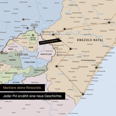 Political map of South Africa with pins and string marking travel destinations and the travel route in Lesotho and KwaZulu-Natal.