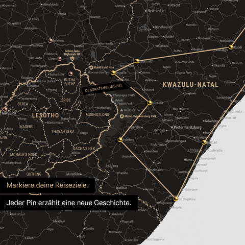 South Africa map in light black color with pins and string marking travel destinations and the travel route in Lesotho and KwaZulu-Natal.