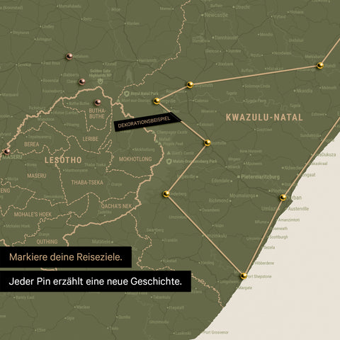 South Africa map in olive green color with pins and string marking travel destinations and the travel route in Lesotho and KwaZulu-Natal.