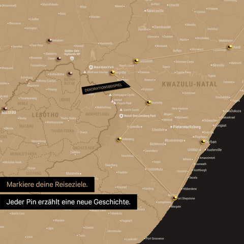 South Africa map in Sonar Black color (black-gold) with pins and string marking travel destinations and the travel route in Lesotho and KwaZulu-Natal.