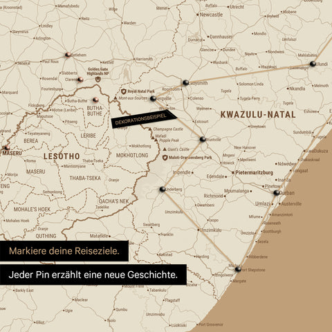 South Africa map in Treasure Gold color with pins and thread, marking travel destinations and the travel route in Lesotho and KwaZulu-Natal.