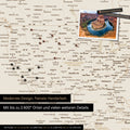 Detailed view of the FINELINE world map as a pinboard in bronze color with marked travel destinations in the USA, Canada, and Mexico