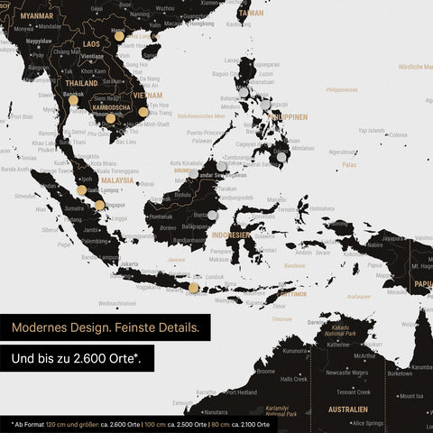 Ausschnitt einer magnetischen Weltkarte in Light Black (Weiss Schwarz) zeigt Karte von Asien, auf der Magnete Reiseziele markieren