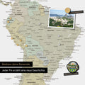 Detail of a magnetic world map as a magnetic board in multicolor sage showing South America with a pinned photo as well as travel and vacation magnets
