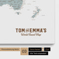 Personalization of a Multicolor Light world map pinboard with a vintage-look logo, where the names and the subtitle "World Travel Map" can be changed